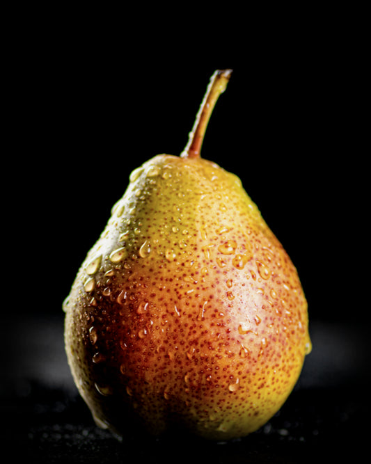 Pear representing the juicy fruity notes of Midnight Orchard Fragrance Oil