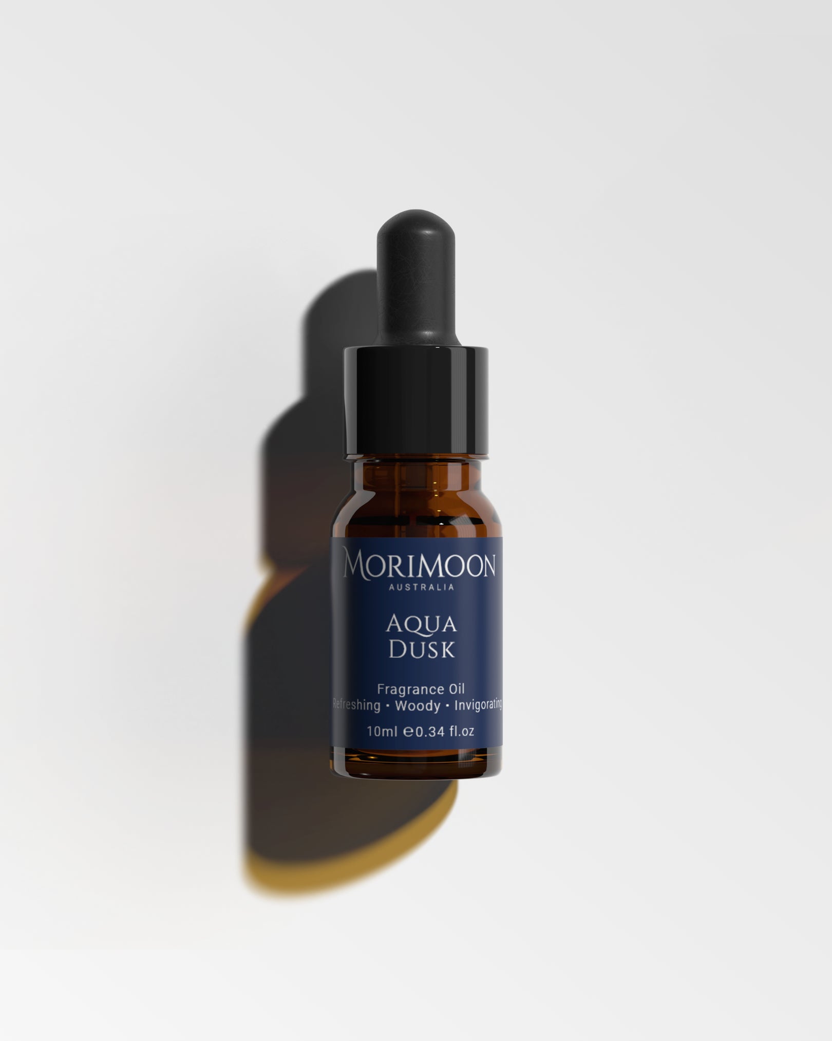 Morimoon Aqua Dusk Fragrance Oil bottle with oceanic and woody scent