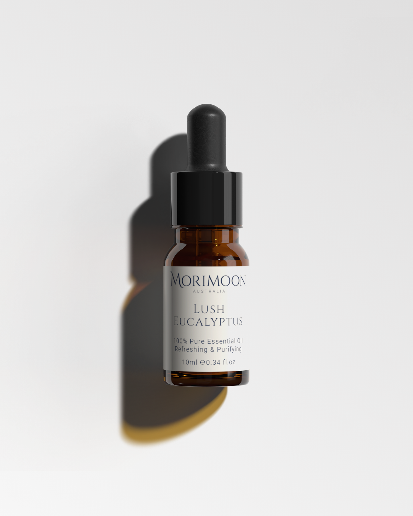 Amber bottle of Morimoon Lush Eucalyptus Pure Essential Oil with fresh, clarifying scent
